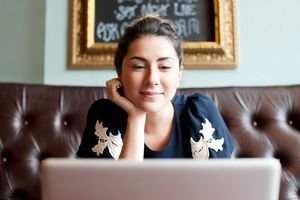 Woman Looking at Laptop