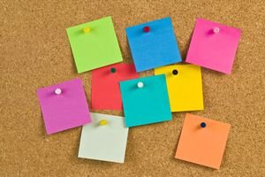 Sticky notes on a bulletin board