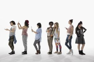 Cool young women using cell phones