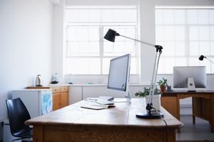A computer sitting on a desk.