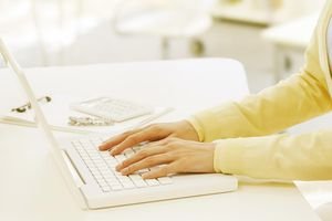 Woman Hand On Keyboard