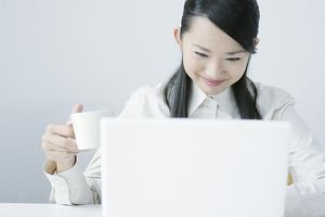 Businesswoman Holding Cup Of Tea