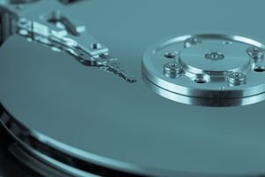 Close-up view of a hard drive platter and arm