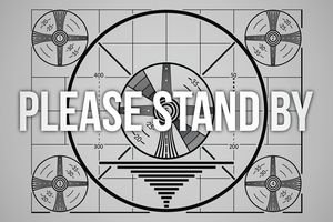 Picture that reads Please Stand By