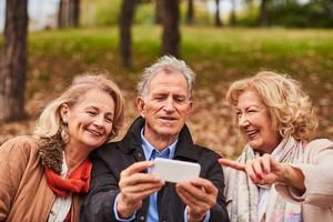 Senior adults with smartphone.