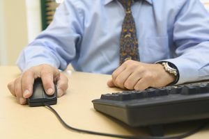 Businessman Sitting at Desk