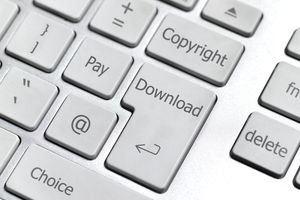 Image of a download button on a computer keyboard