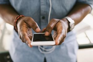 man holding cell phone