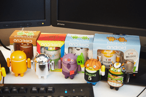 Picture of an assortment of Android figurines wearing costumes