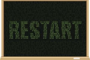 RESTART spelled in 1s and 0s on an illustration of a chalkboard
