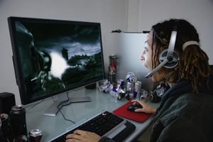Figure 1-1: A screen shot of a woman playing a computer game and winning.
