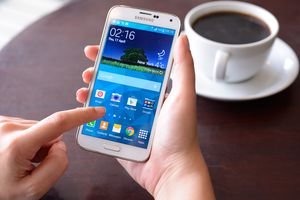 Woman using Android phone